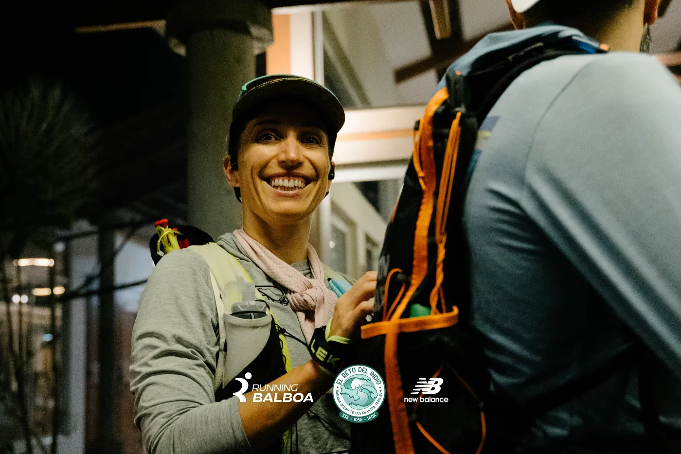 Runner smiling at night start